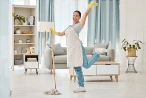 a maid is mopping the floor